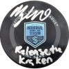 Morgan Geekie Autographed Official Seattle Kraken Logo Hockey Puck Inaugural Season Logo W/ "Release The Kraken" Inscription Fanatics